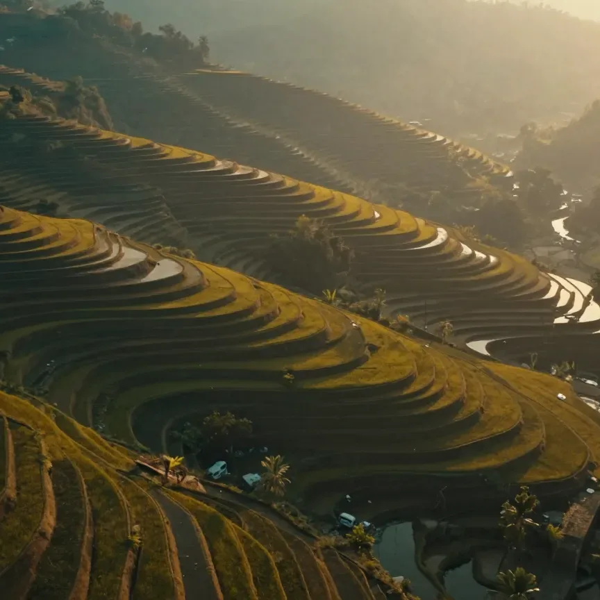 An aerial view of terraced fields at golden hour — a concept sequence prototyped for a studio